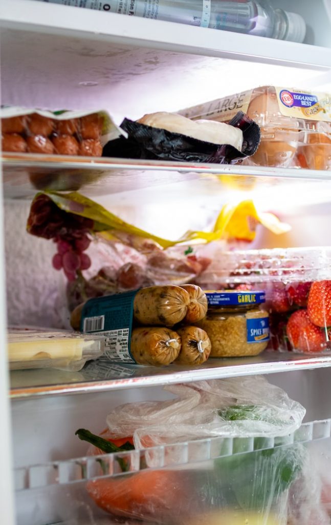 a refrigerator filled with lots of food and drinks